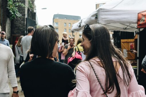 women walking through a London market