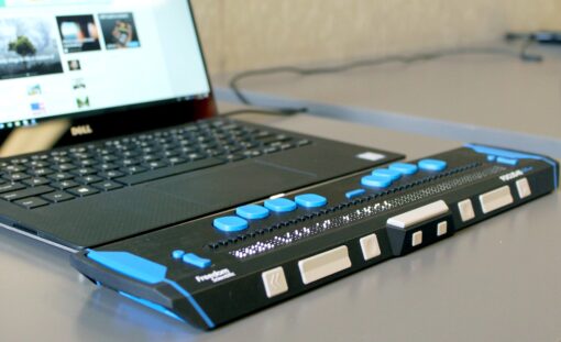 A laptop with a refreshable braille display.