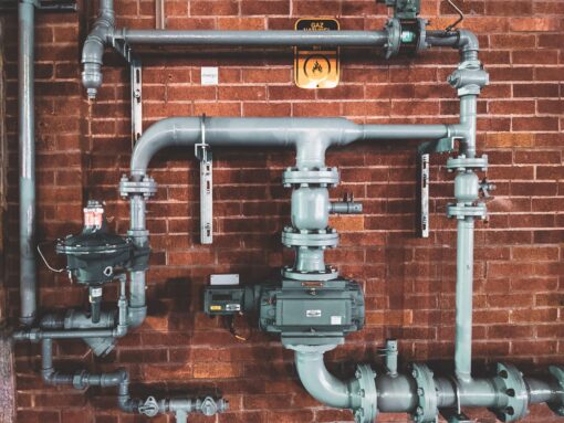 an image of a complex network of pipes in a home