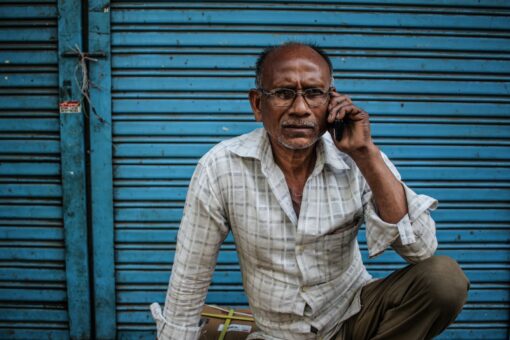 image of a man talking on phone